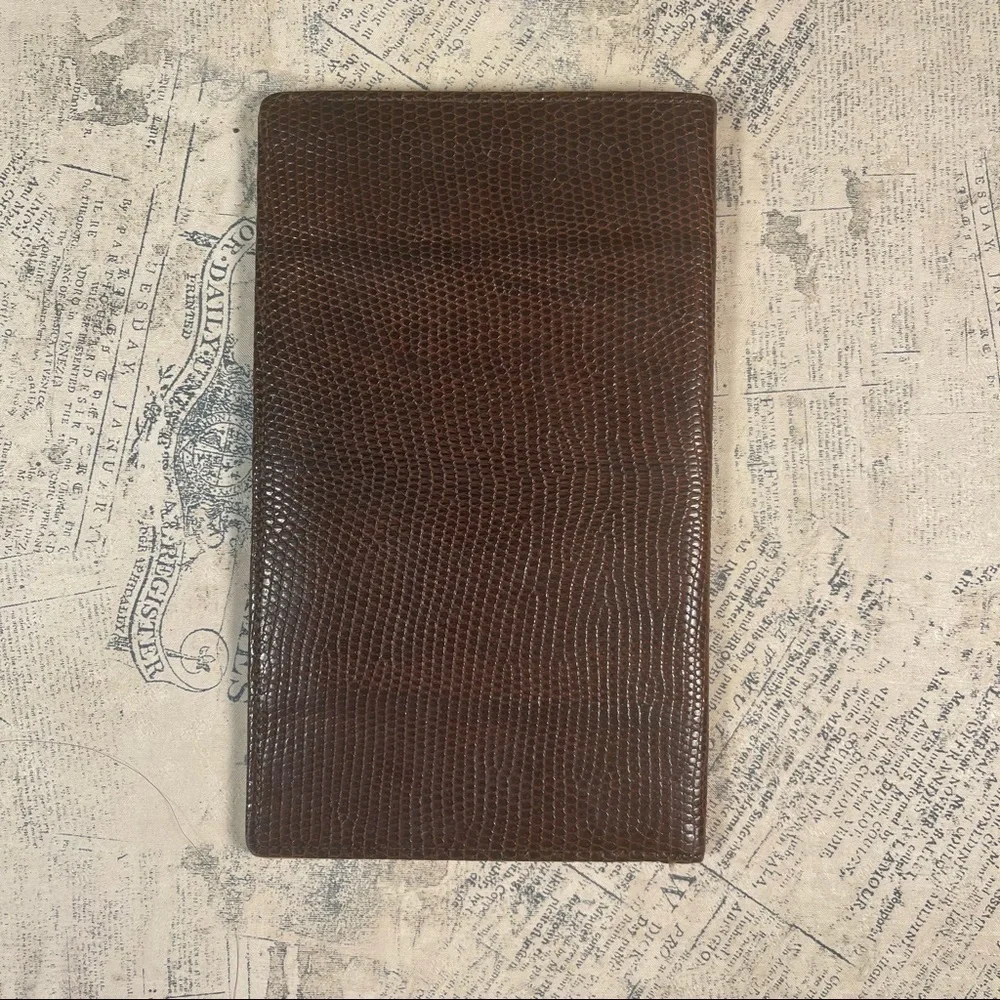 Smythson Antique lizard skin passport wallet with gold corners
